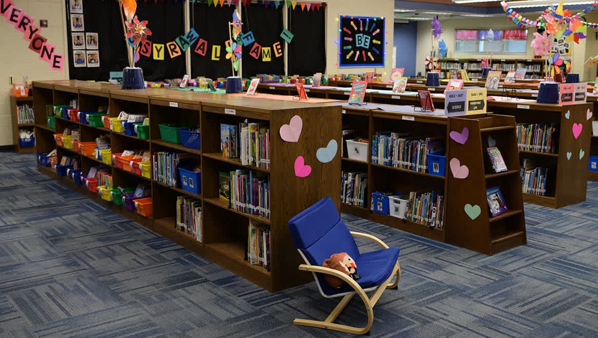Elementary media center with short shelfs filled with books