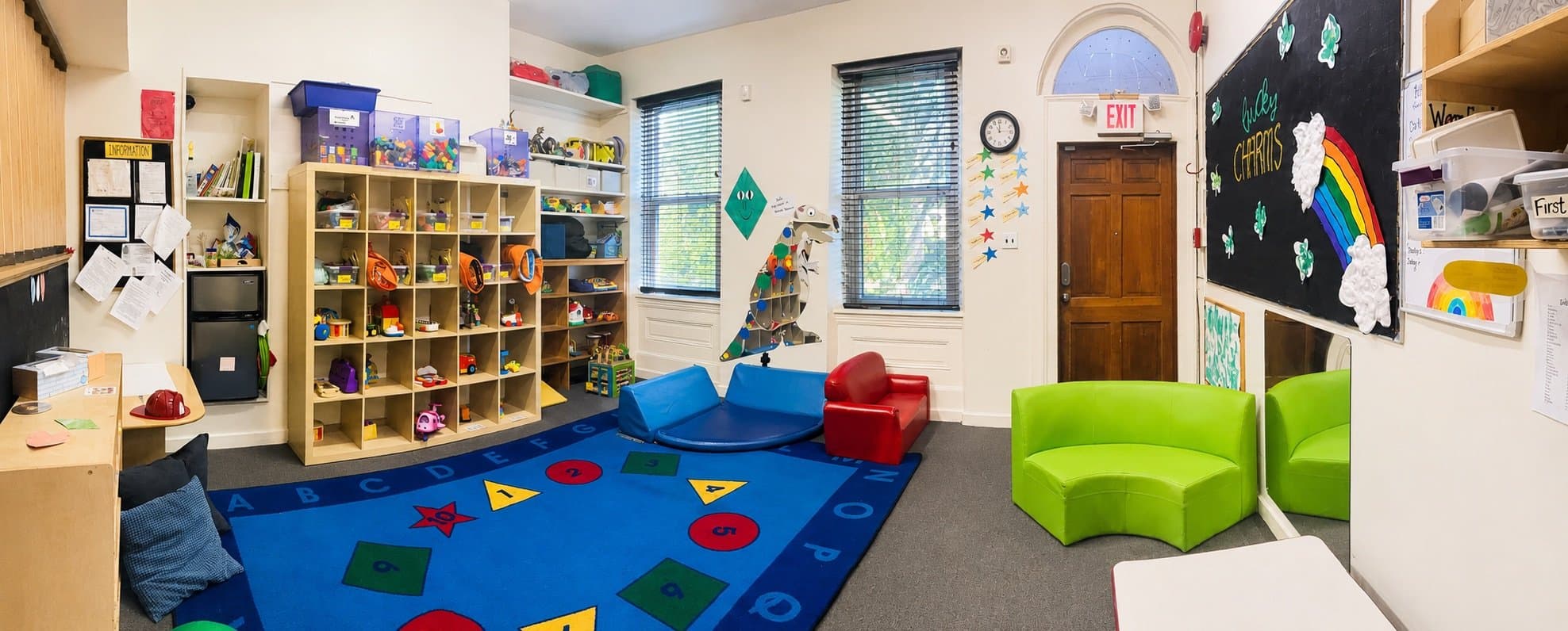 Welcoming early childhood classroom with organized toys, soft seating, and hands-on learning areas at Beginnings Learning Center