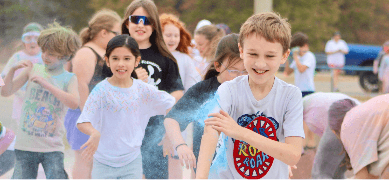 Students run during Color Run event