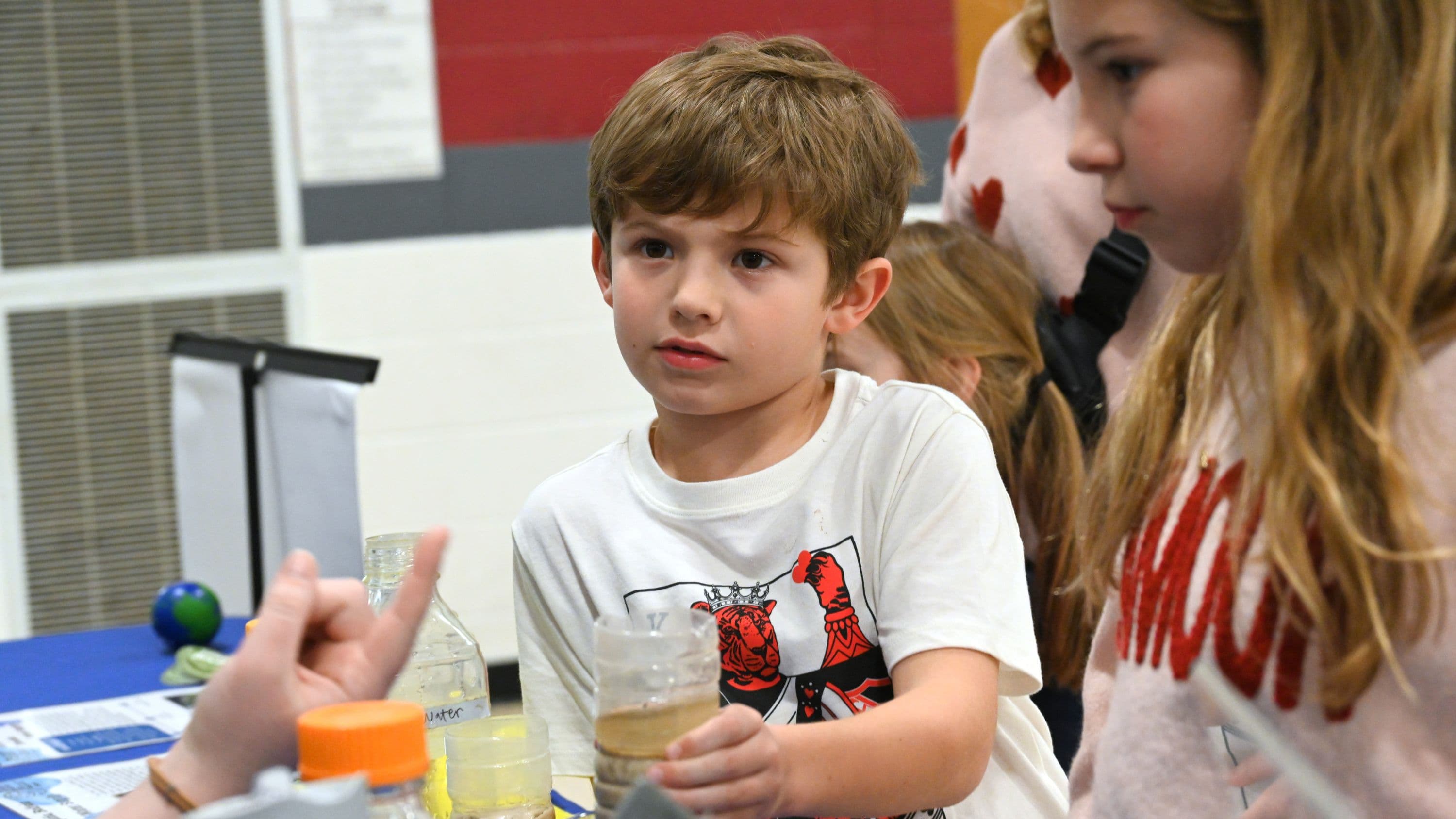 A student doing a science experiment.