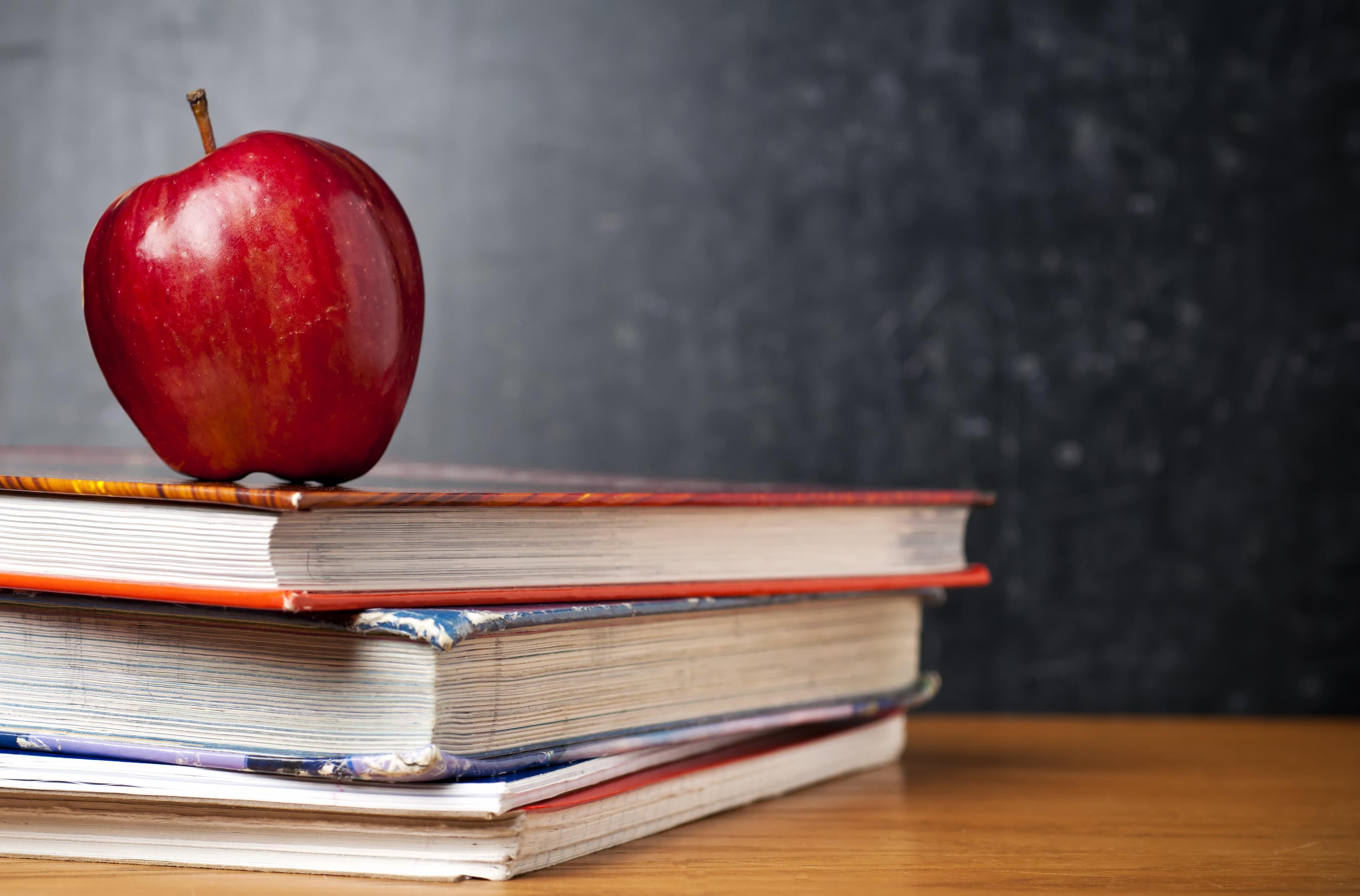 books and an apple
