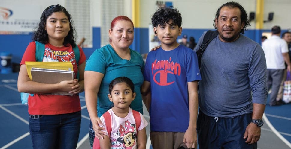 Hispanic family at school event