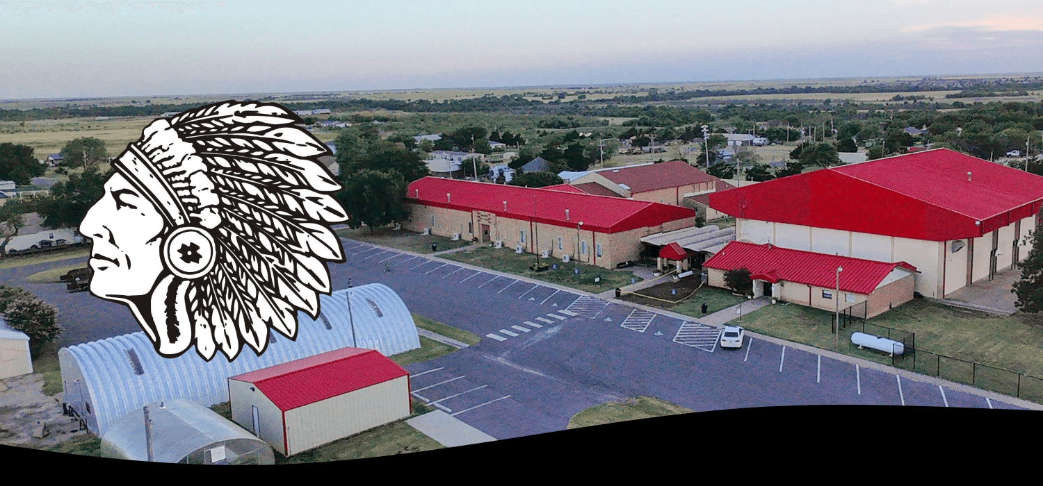 An aerial view shows a building with a red roof and a decorative image overlay.