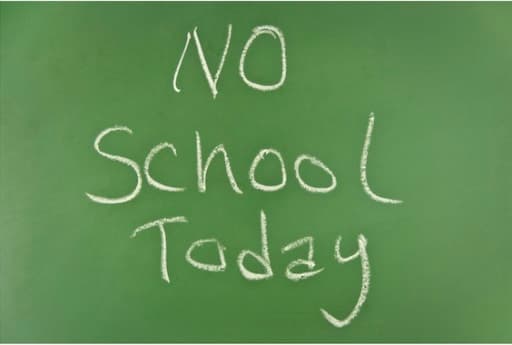 Green chalk board with No School Today written in white chalk.