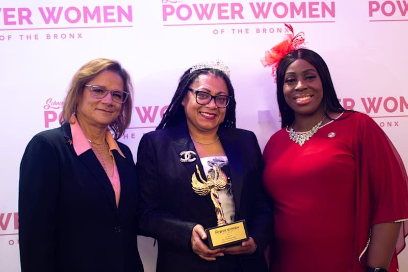 Dr. Charlene Reid (center) poses with trophy alongside Bronx Chamber of Commerce President Lisa Sorin (left) and Bronx Borough President Vanessa L. Gibson (right) at 2025 Bronx Power Women event
