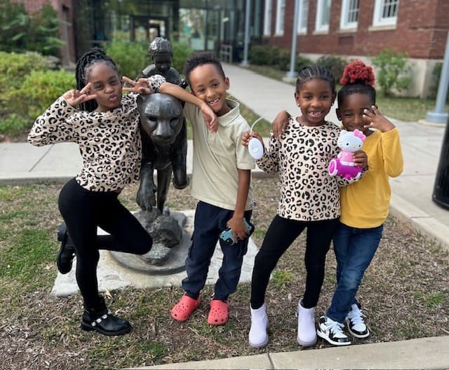 Family showing Cheetah Pride
