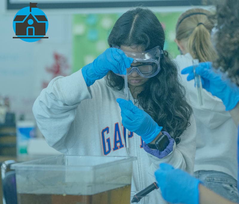 This is an image of a student working in a middle school science class.