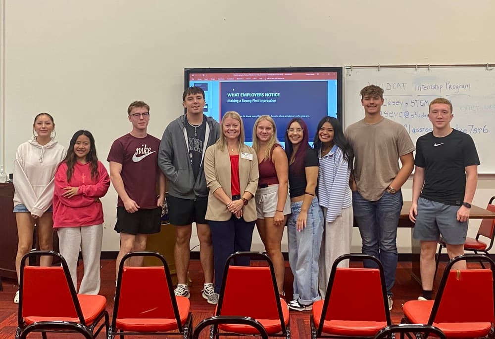 Photo of students with guest speaker
