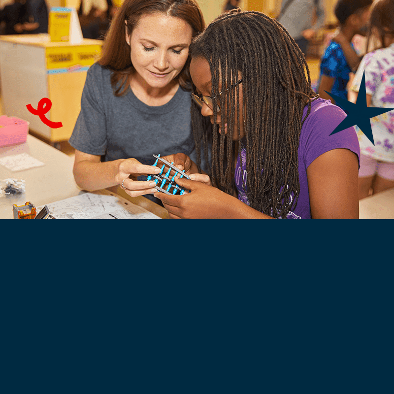 Teacher helping a student