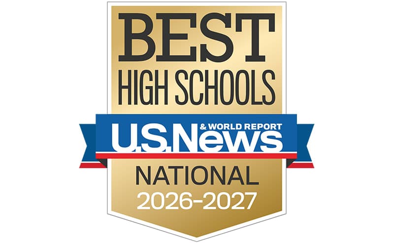 A gold shield with "BEST HIGH SCHOOLS" at the top, a blue banner with "U.S. News & World Report" in the middle, and "NATIONAL 2026-2027" at the bottom, all on a white background.