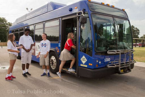 Students boarding Tulsa Transit bus