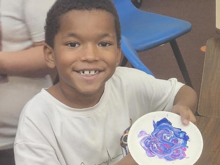 Student participating in a STEM activity