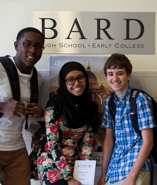 Three smiling students