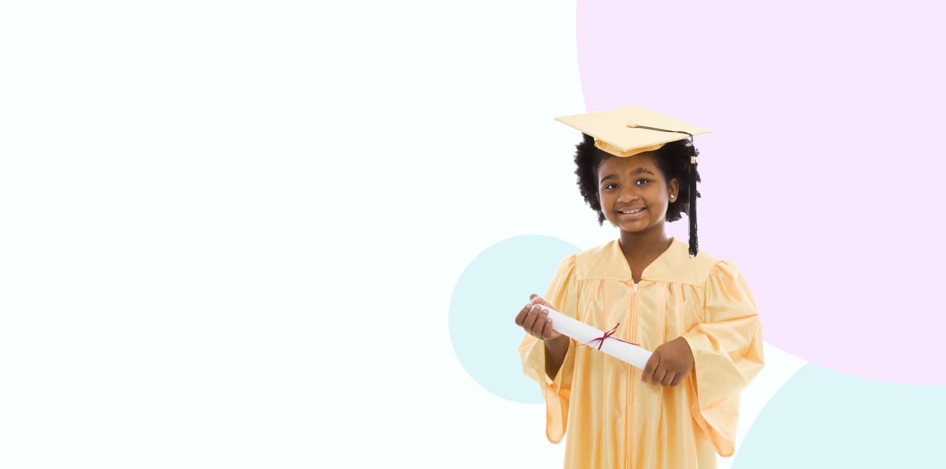kid wearing their graduation robe