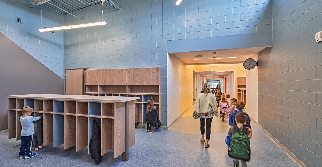 The ECC classroom hallway is divided into different sections each with their own color to help reinforce learning colors.