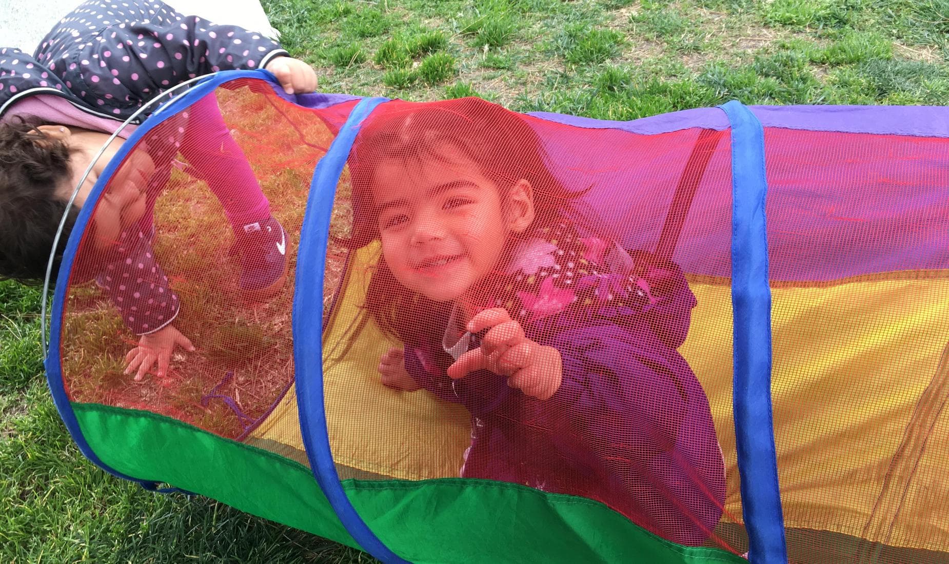toddler playing on playground