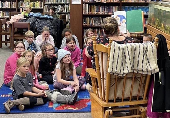students listening to story