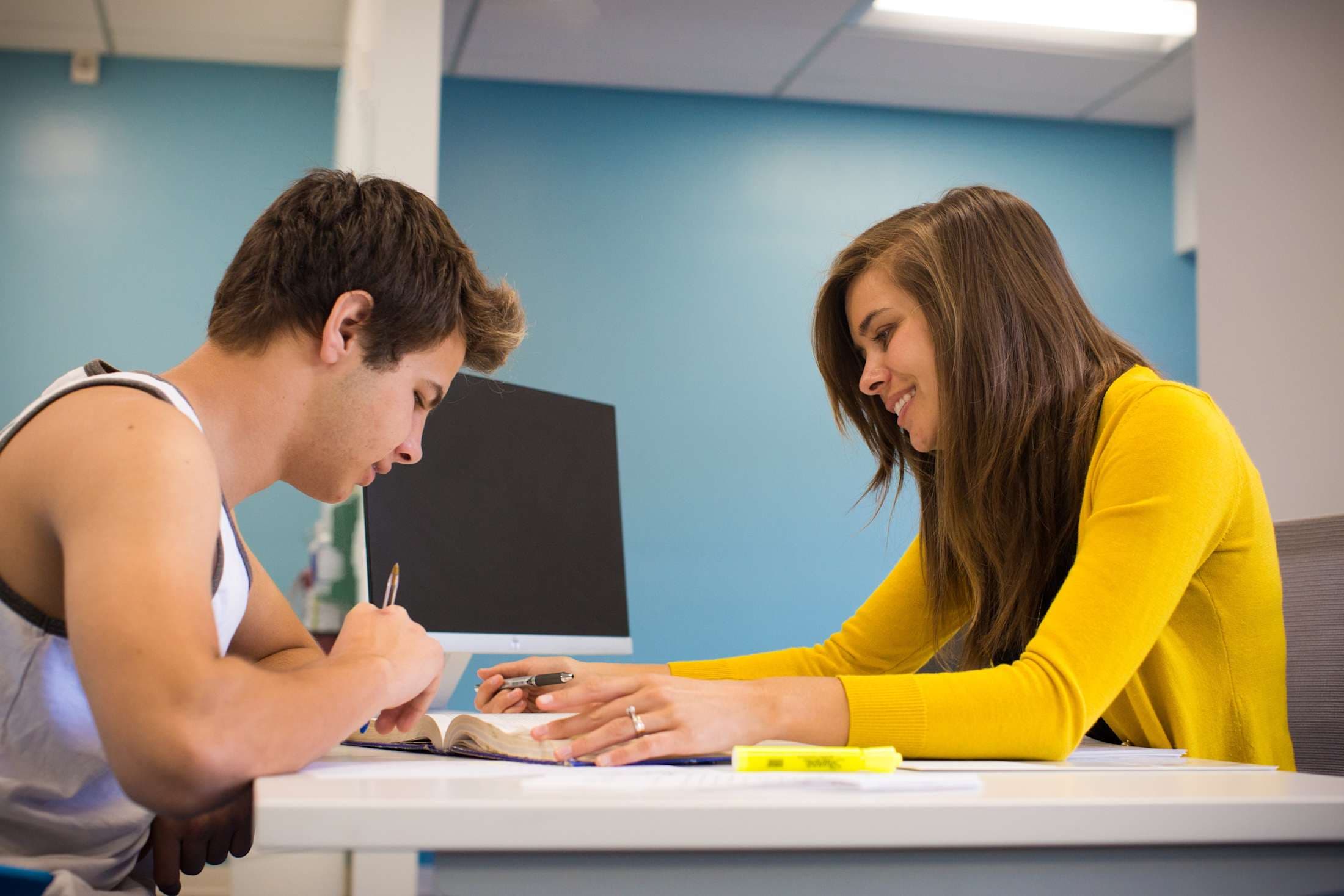 Two students at a table