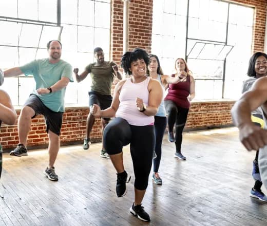Group of people working out together having fun