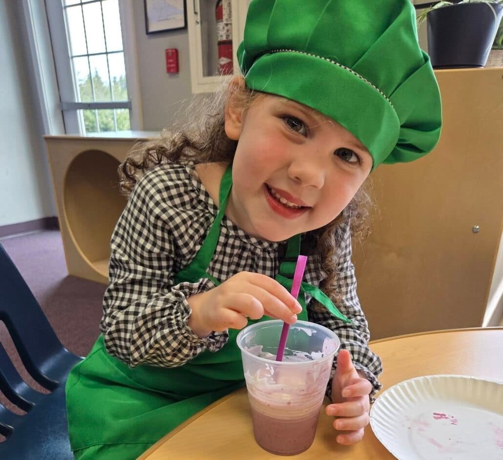 child making food at preschool and daycare at cadence academy preschool smyrna, delaware