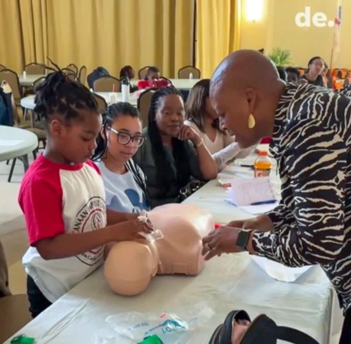 Carrcroft 2nd Grader participating in CPR class