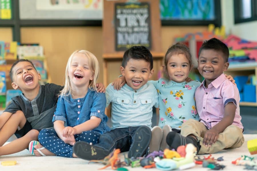 group picture of children laughing