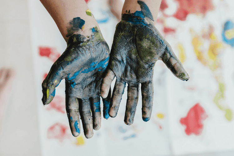 Image depicting children's hand-paint activity used for preschool program information.