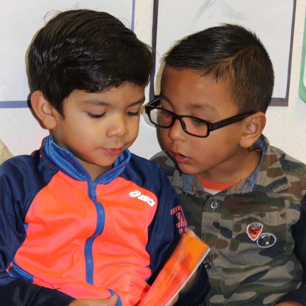 Children reading in a classroom