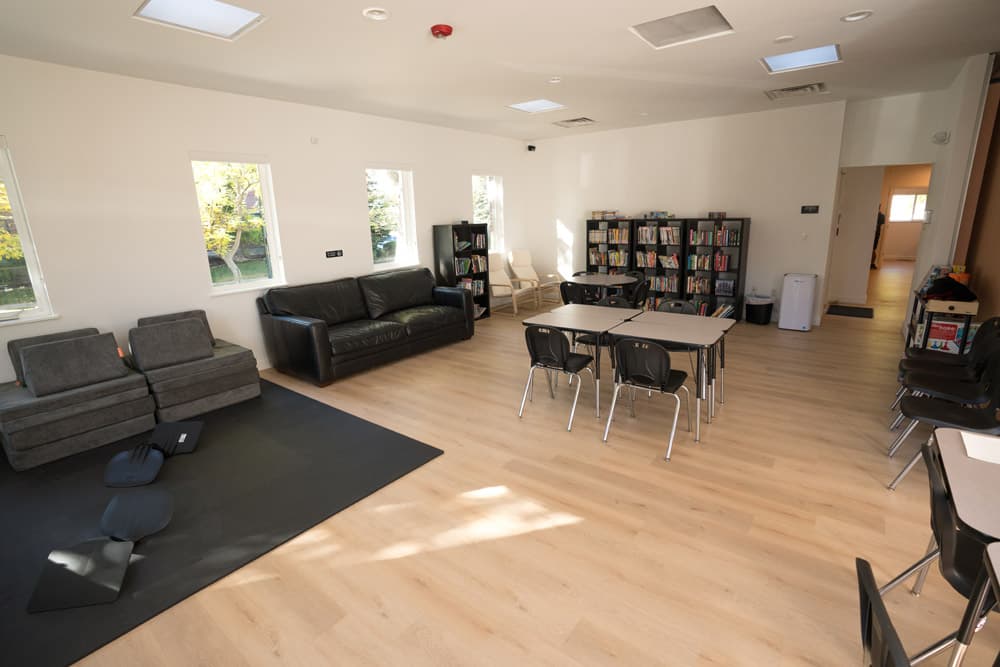 Study room with bookshelves and seating for focused work.