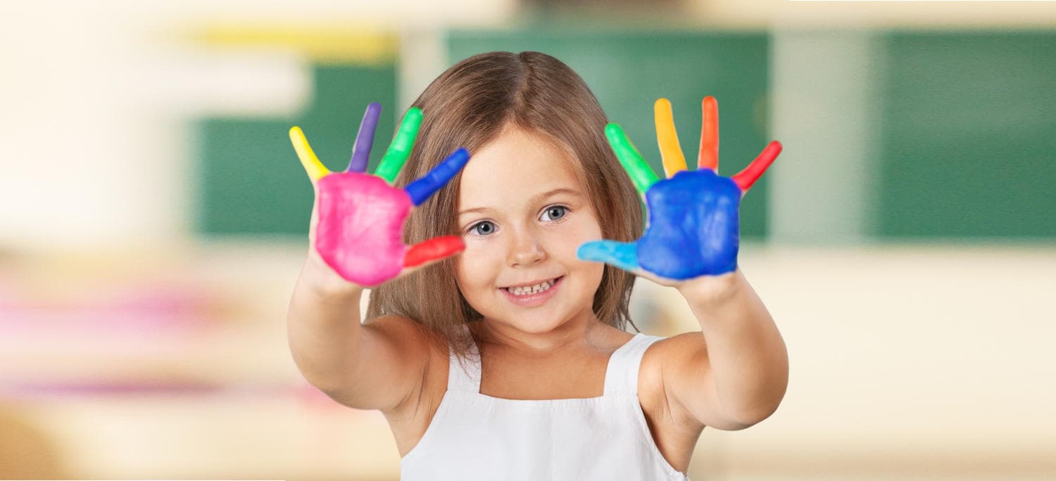 Young child in a classroom setting.