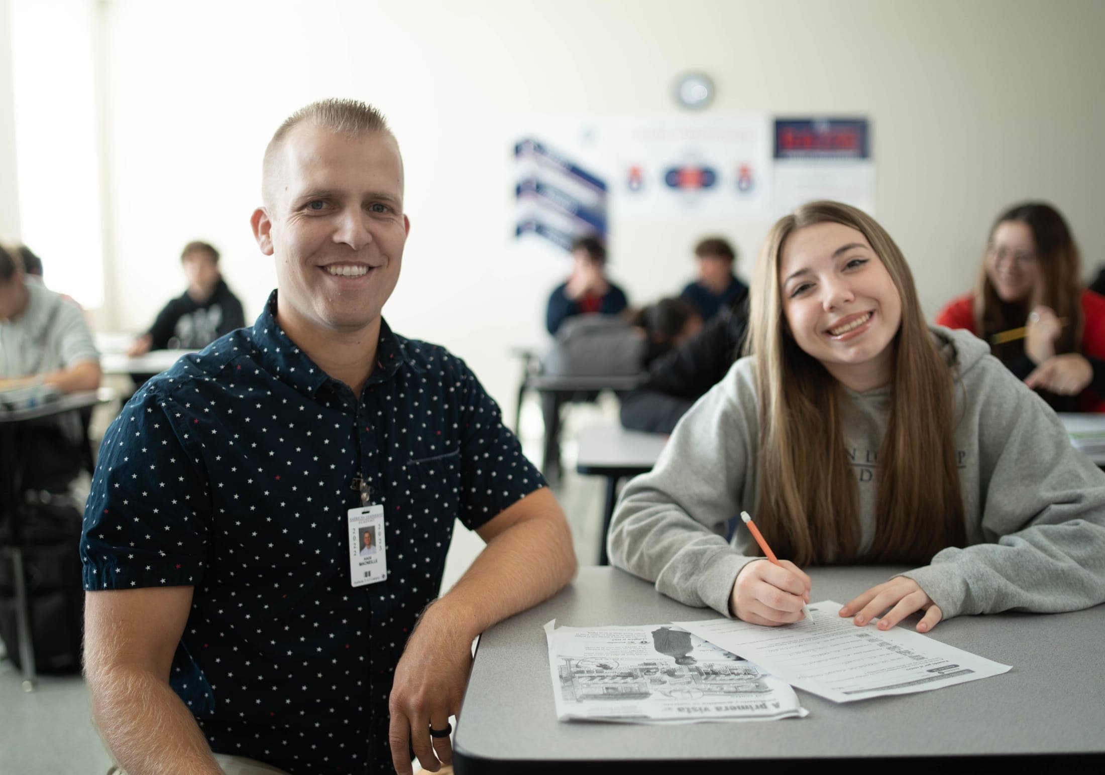ALA Anthem South Teacher and Student smiling for a photo in class