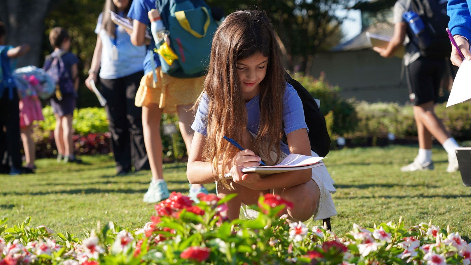 girl reading outside