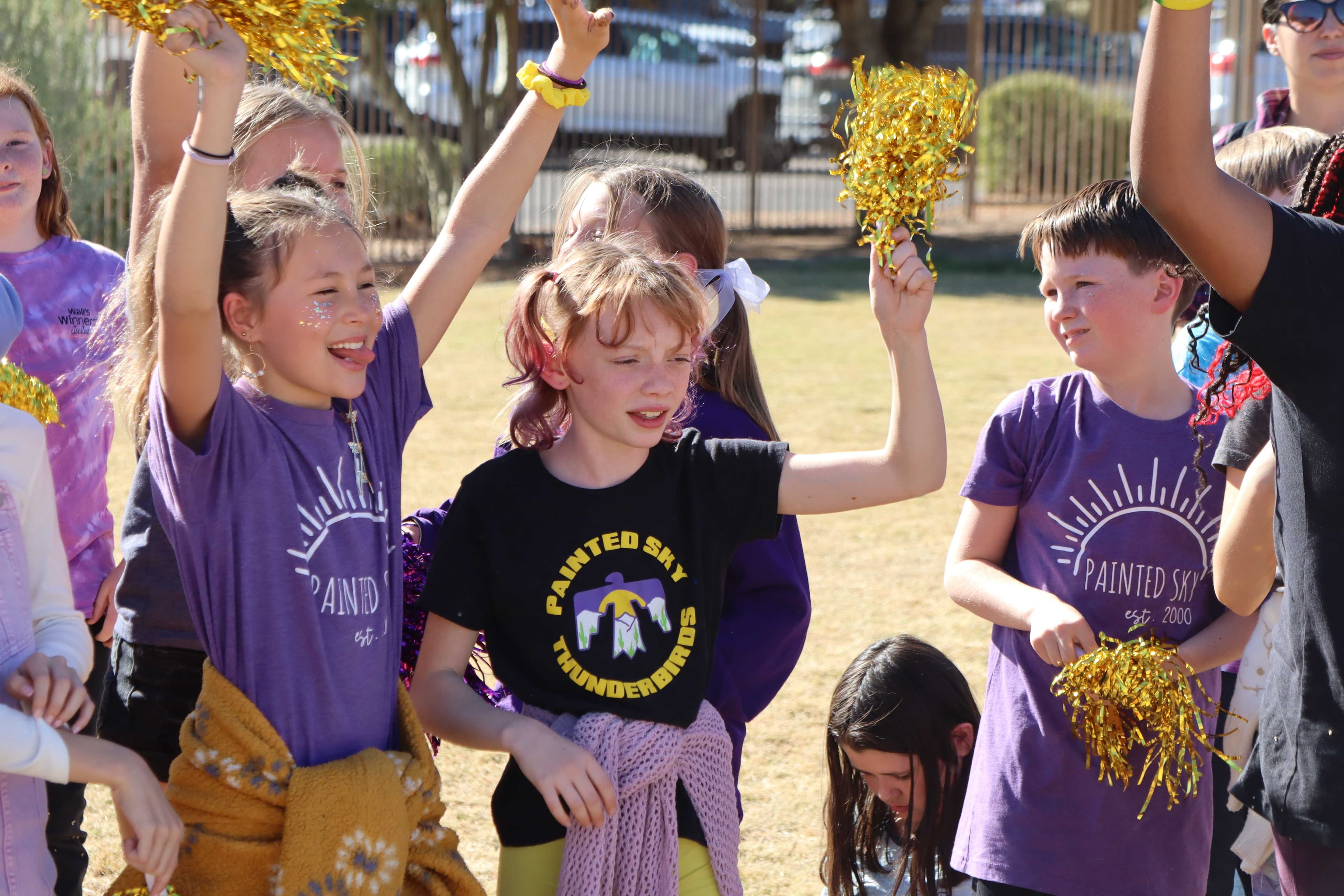 students cheering outside