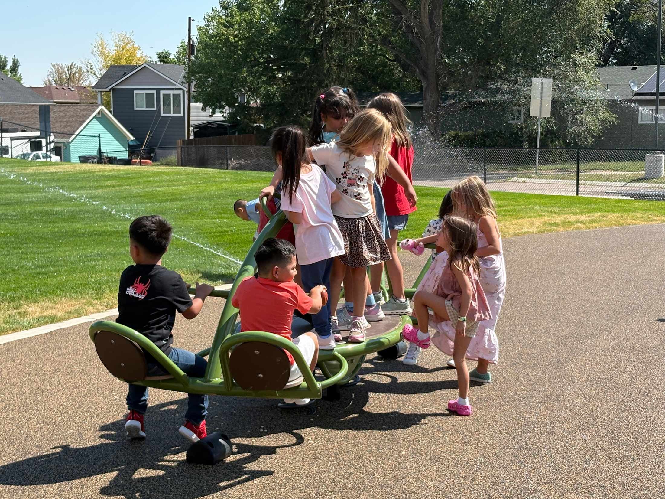 Students playing on the teeter-totter