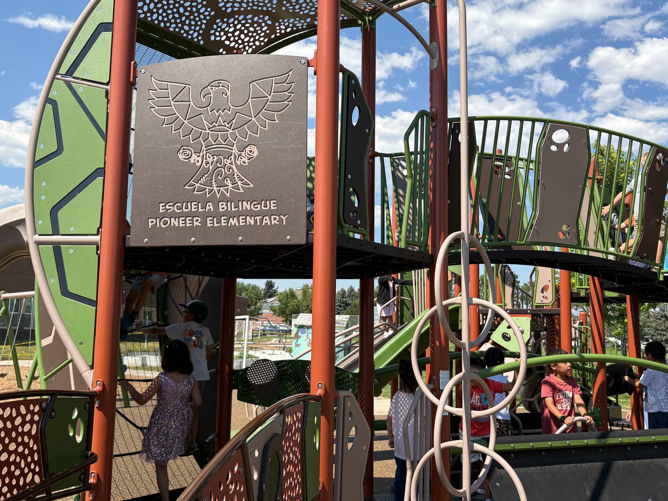 Emblem of the Pioneer logo on the new playground structure
