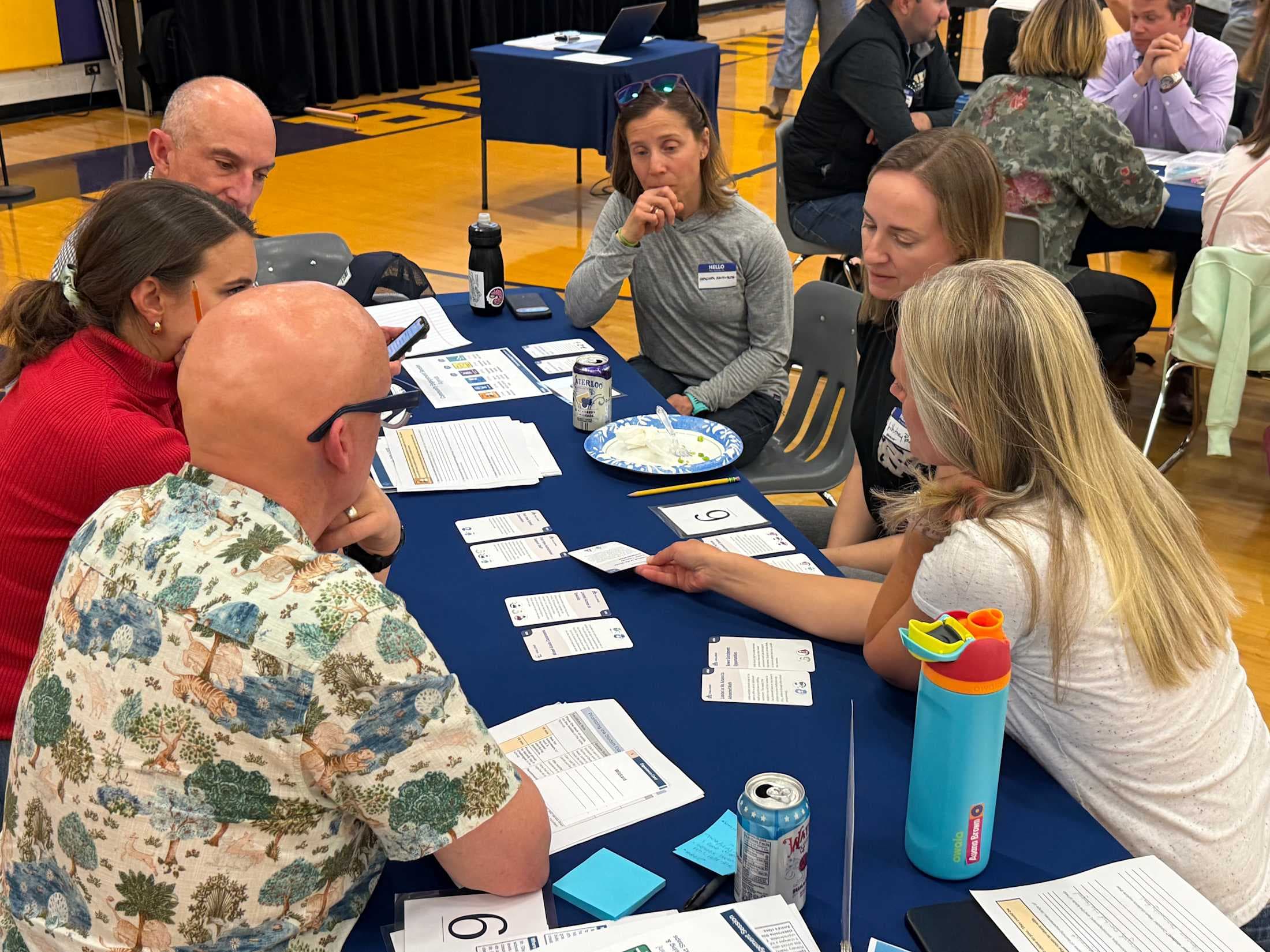 adults talking around a table