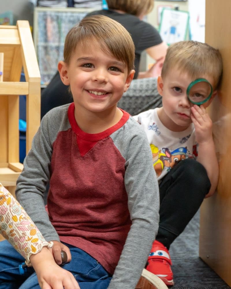 Two male preschool students at Oak Tree Elementary