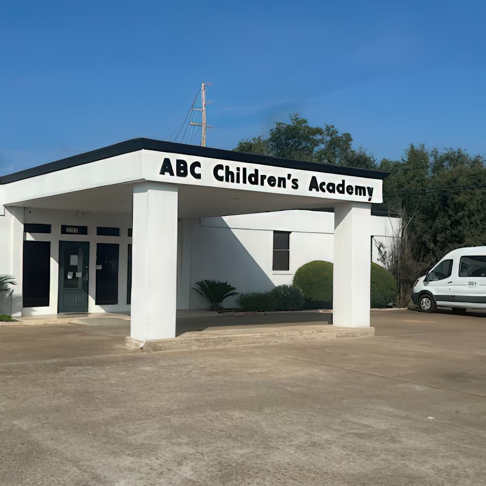 Exterior view of the ABC Children’s Academy building with covered entry and clear signage.