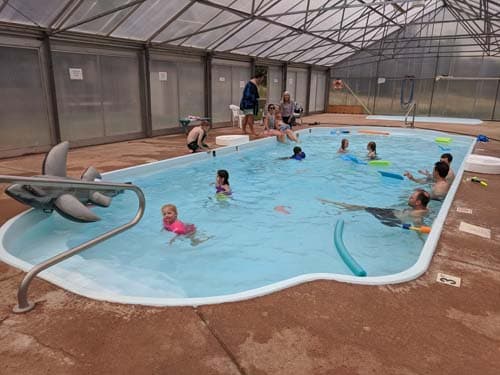 Group camping guests are welcome to use all facilities including the indoor heated pool pictured here.