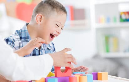 Boy Playing with Blocks