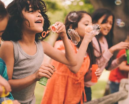Children Blowing Bubbles