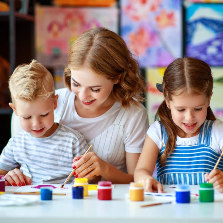 teacher playing with students